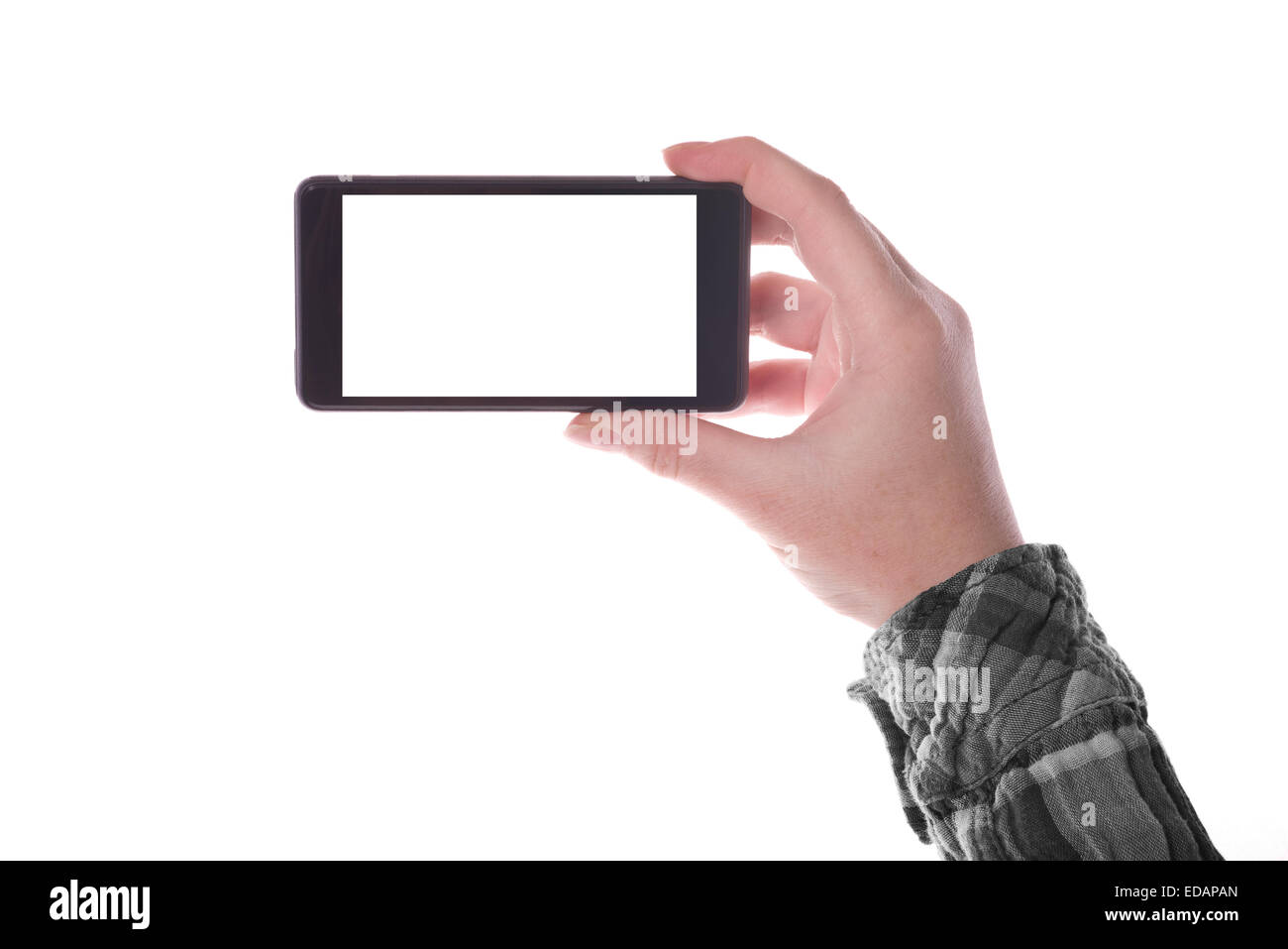 Hand holding Smartphone Device in Vertical Position with Blank White Screen as Copy Space isolated on white background Stock Photo