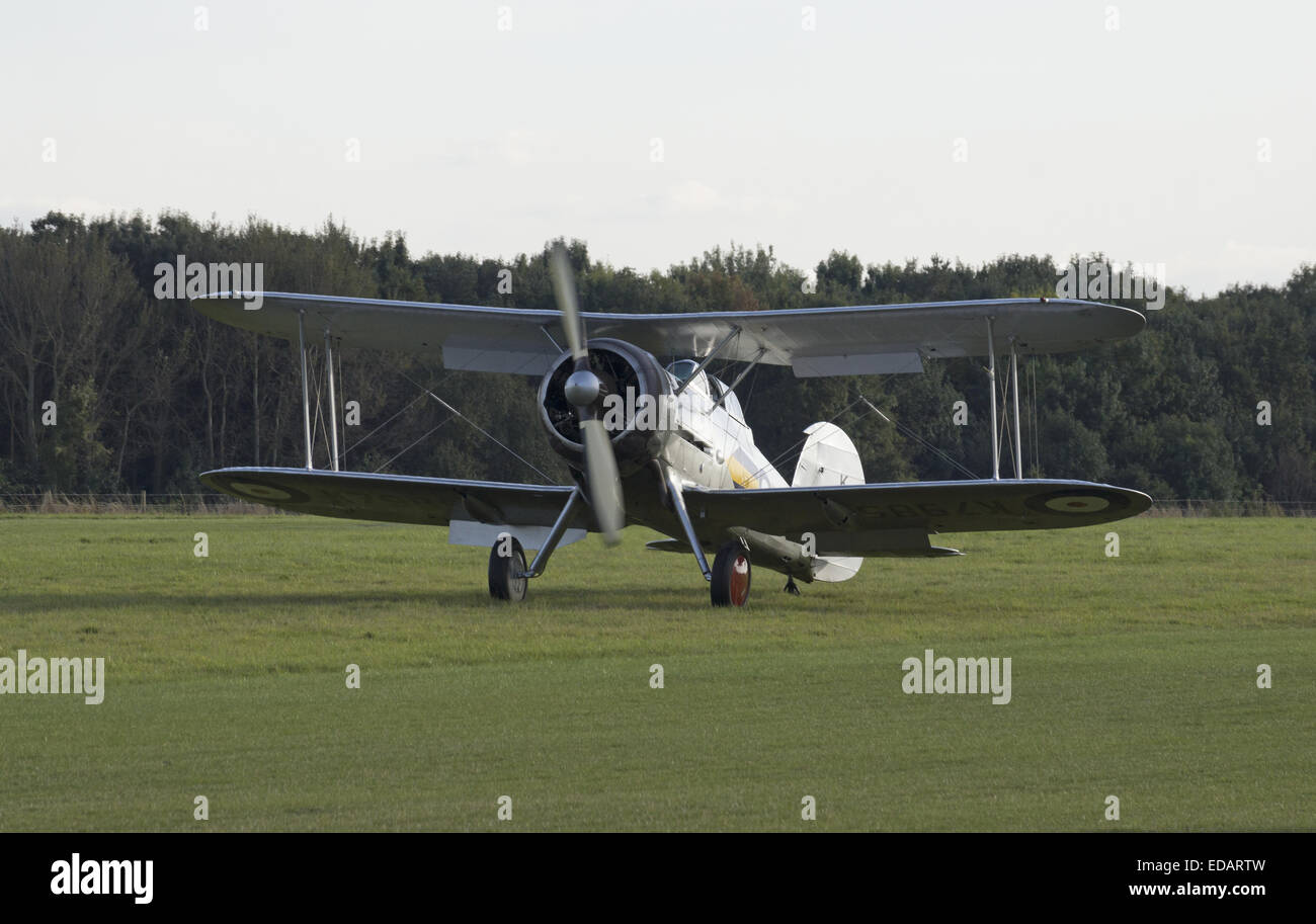 Gloster Gladiator taxing after landing on a grass runway Stock Photo