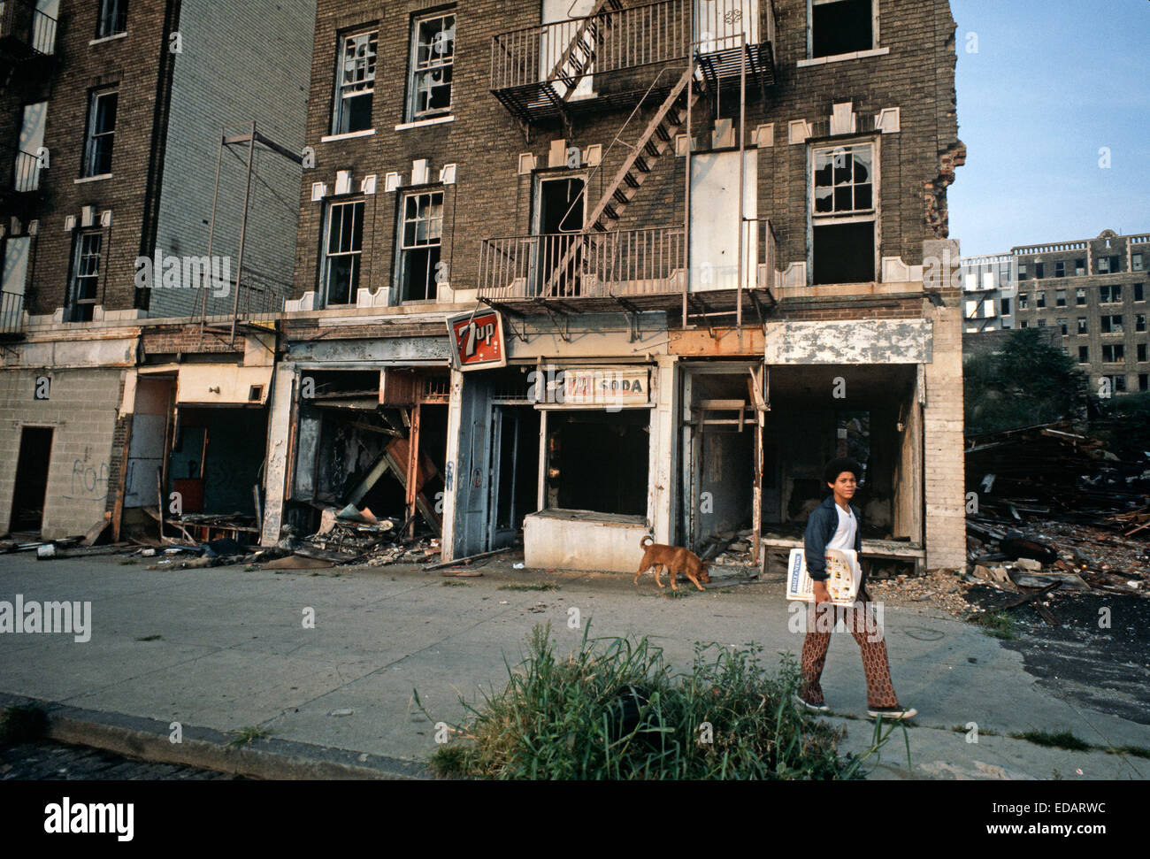 USA, SOUTH BRONX, NEW YORK CITY - AUGUST 1977. Abandoned burnt-out tenement blocks and shops,  South Bronx, New York City, USA. Stock Photo