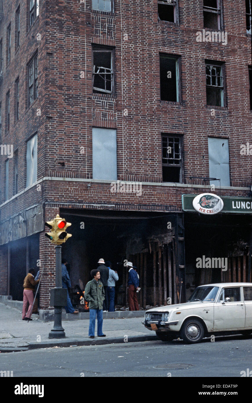 USA, SOUTH BRONX, NEW YORK CITY - AUGUST 1977. Abandoned burnt-out tenement blocks and shops,  South Bronx, New York City, USA. Stock Photo