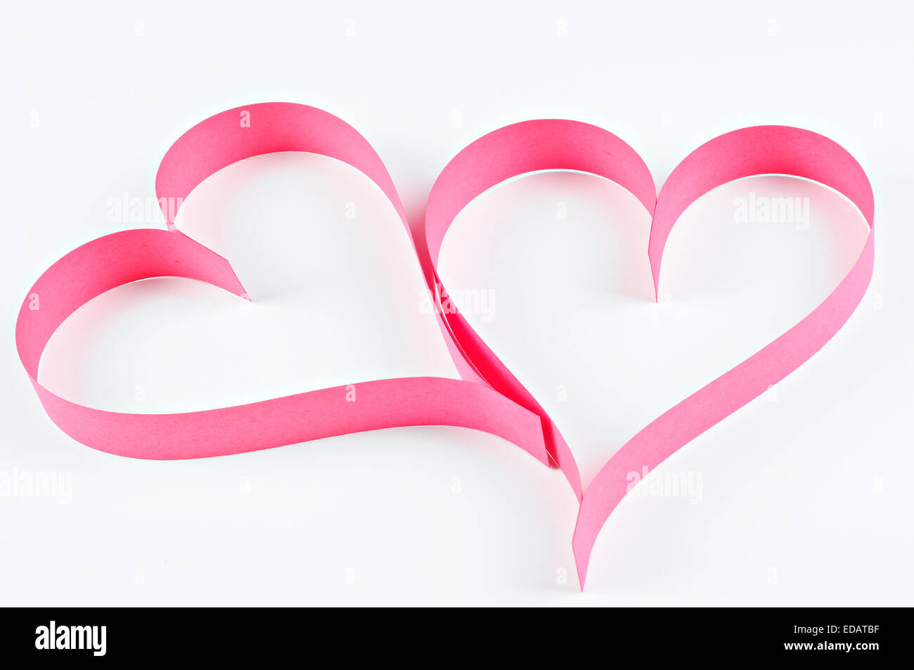 Red hearts made of paper; Valentine's Day concept Stock Photo