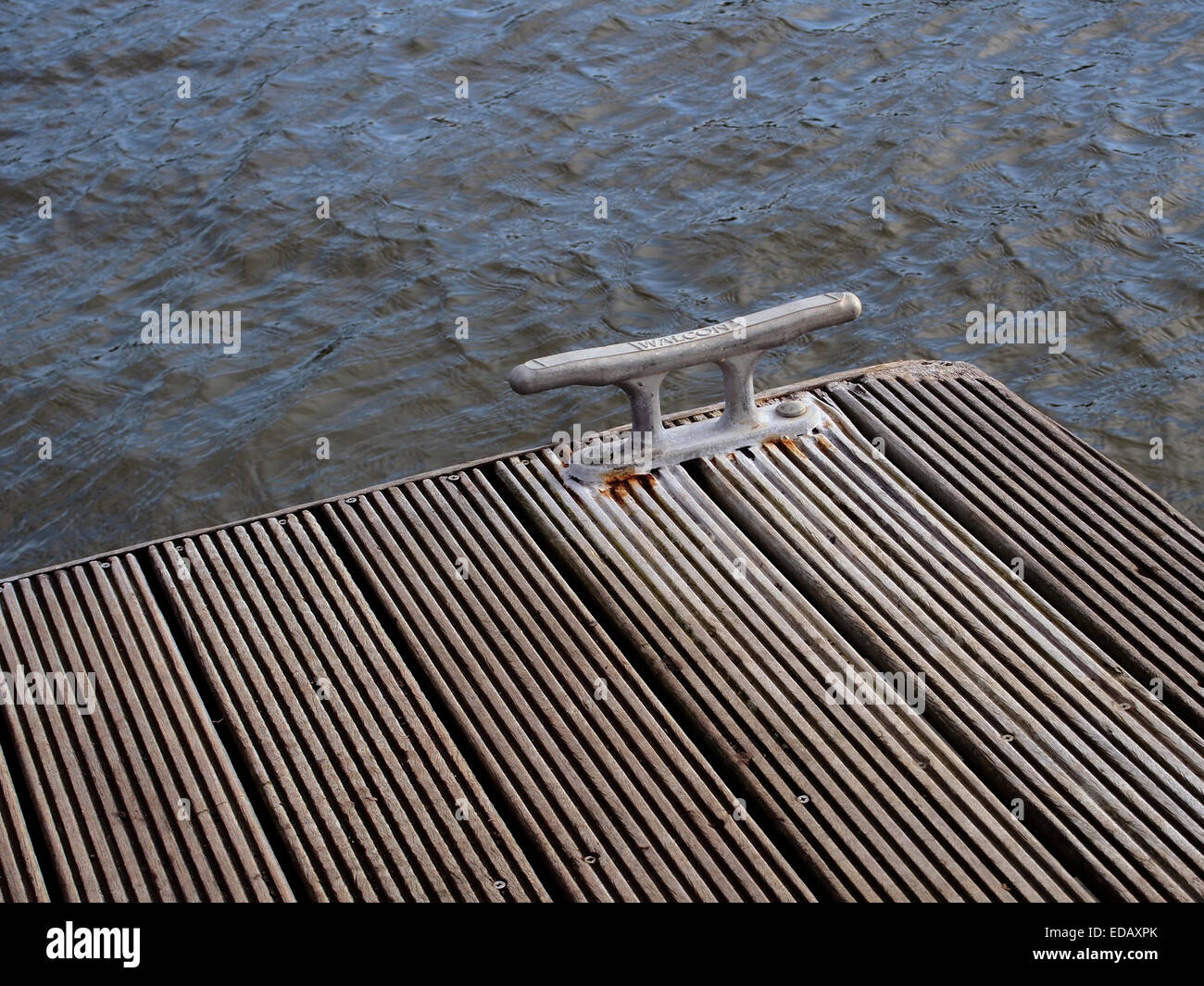 Timber pontoon with galvanised steel mooring cleat on the River Hamble