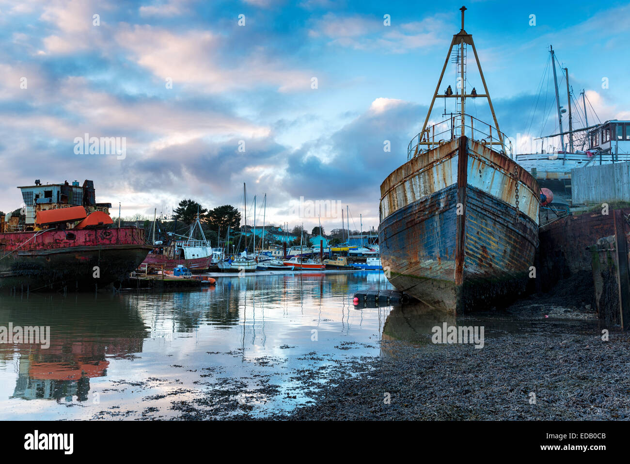 Rusting old boats on the river Tamar in Cornwall Stock Photo