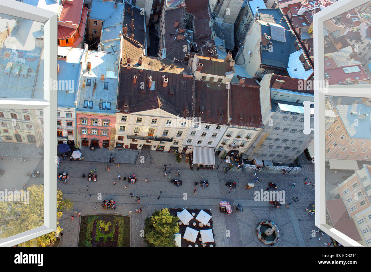 opened window with view of the roofs of city Stock Photo