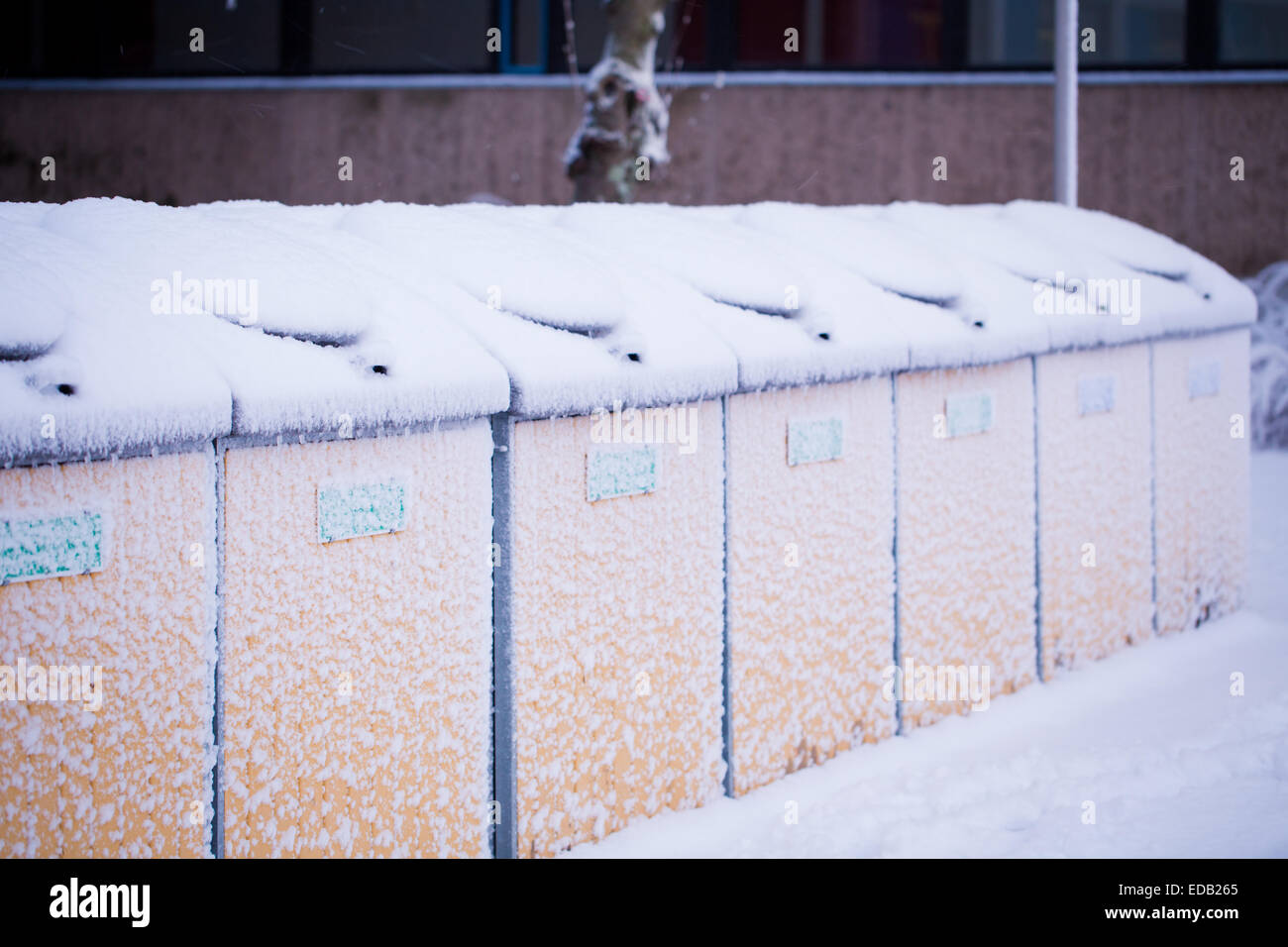 Recycle area is covered by snow in a winter day Stock Photo