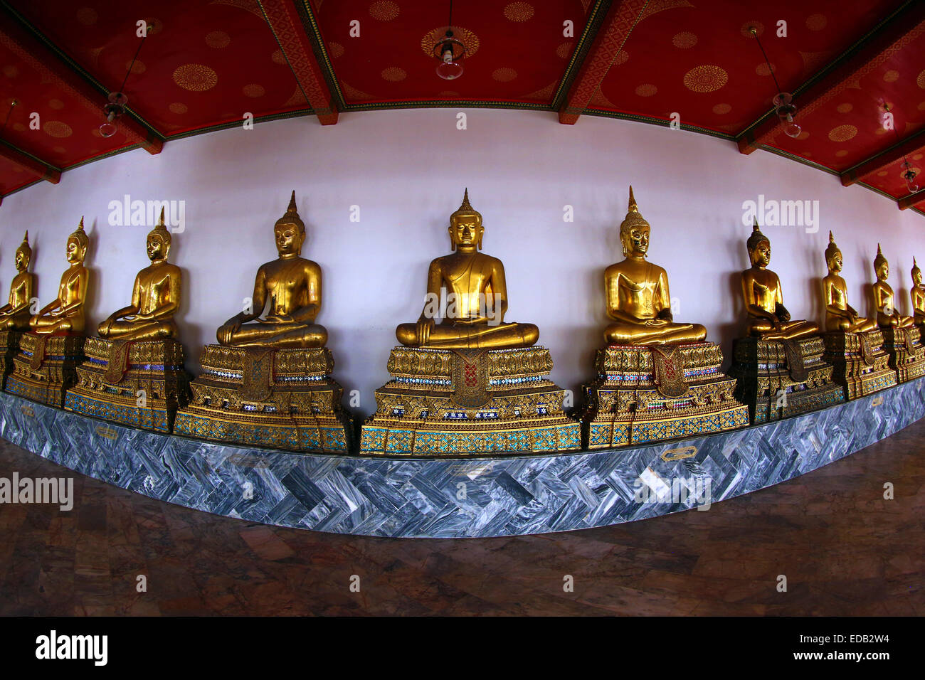 Gold Buddha statues at the Wat Pho Temple Bangkok, Thailand Stock Photo ...