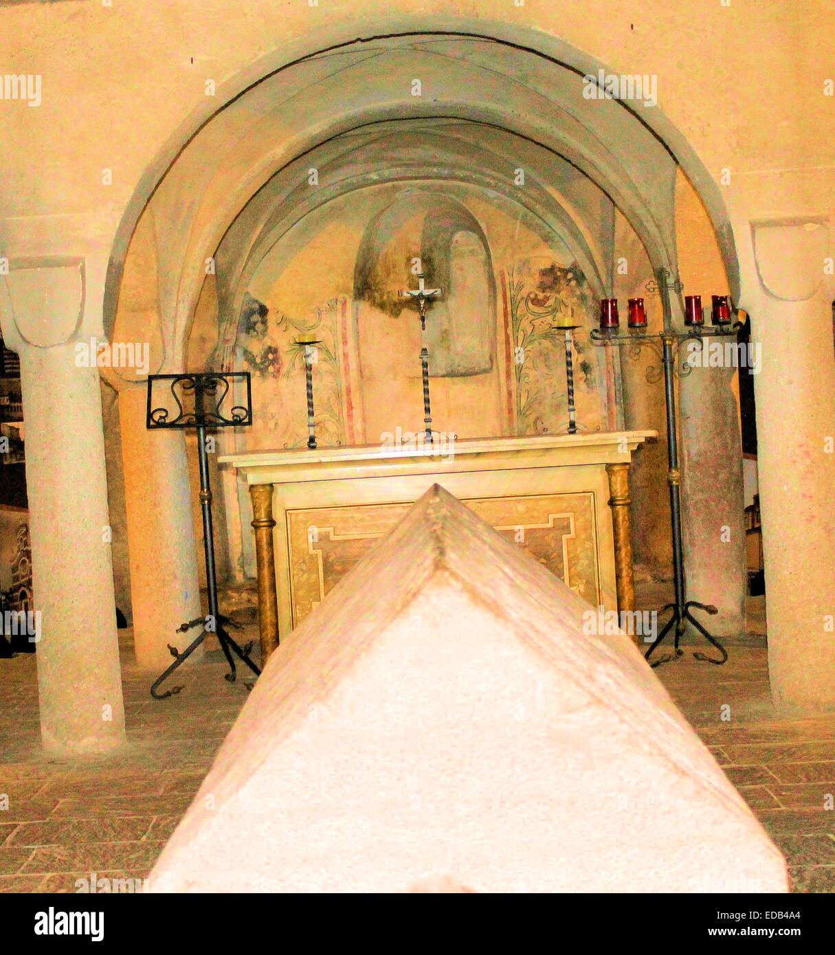 Internal ancient crypt with tomb stone of a church in Maderno in Italy Stock Photo