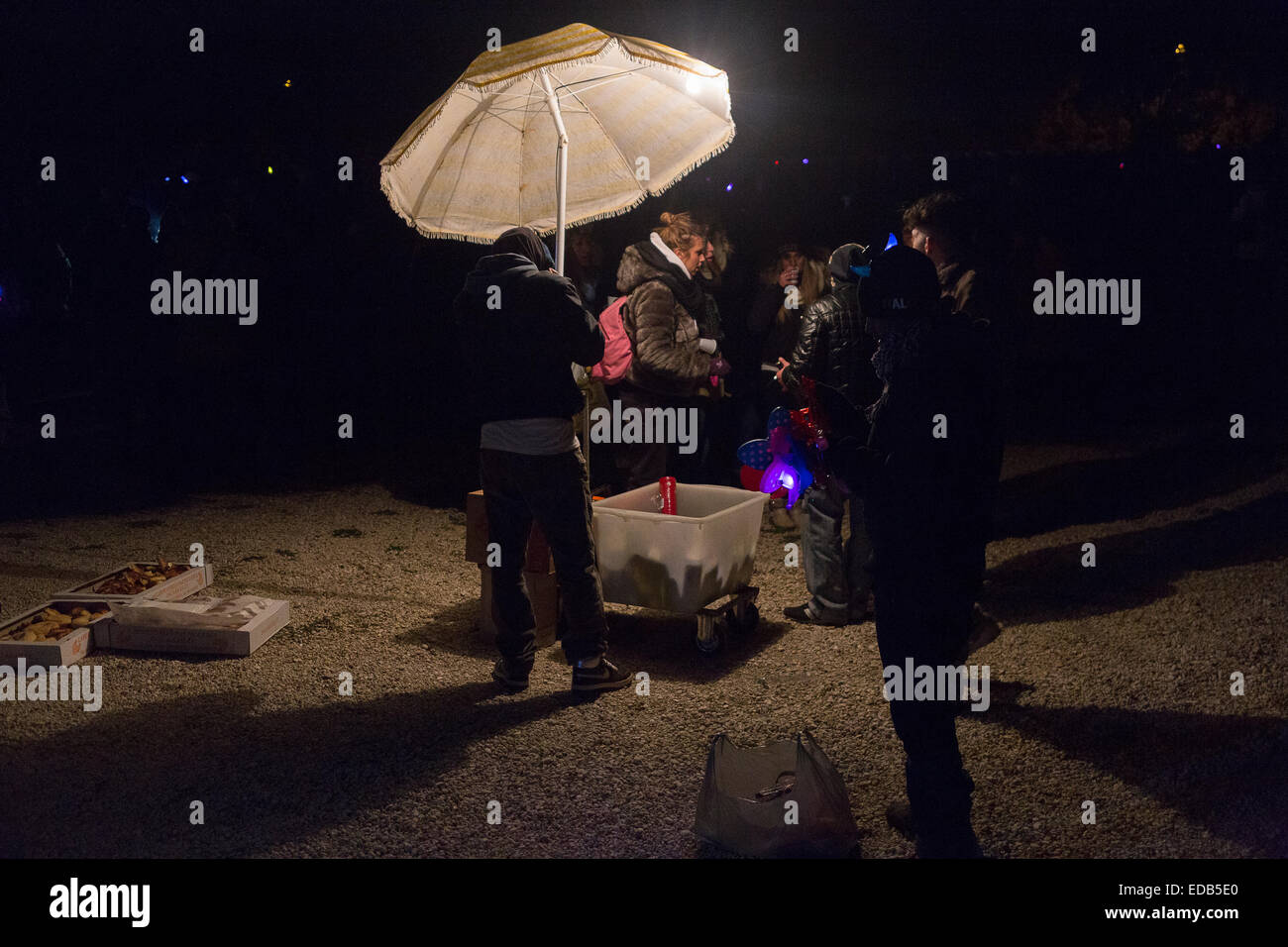 Beer vendor in the night in Circo Massimo, Rome, for New year eve Stock Photo