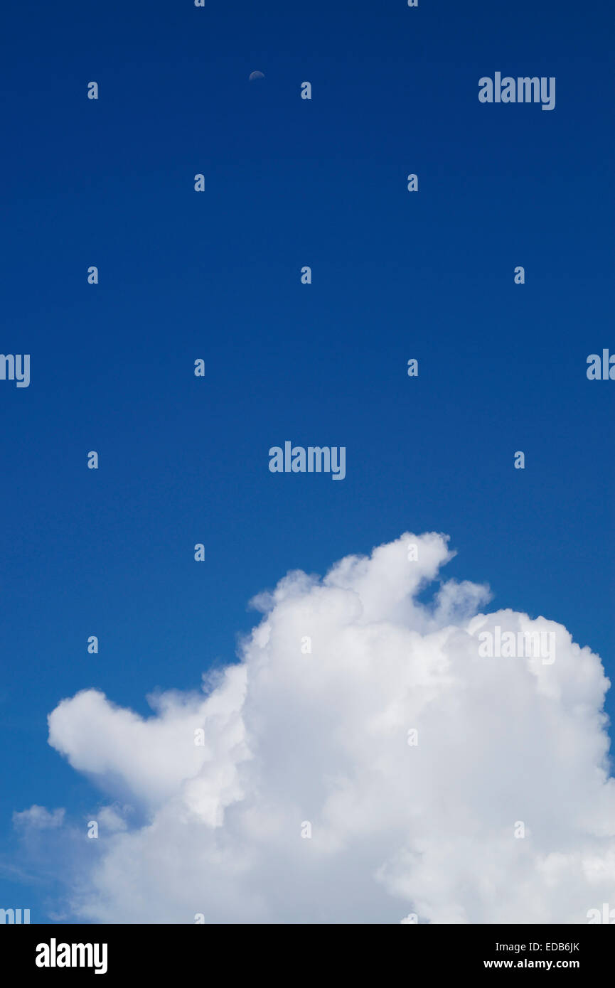 The moon, set above the makings of a storm Stock Photo