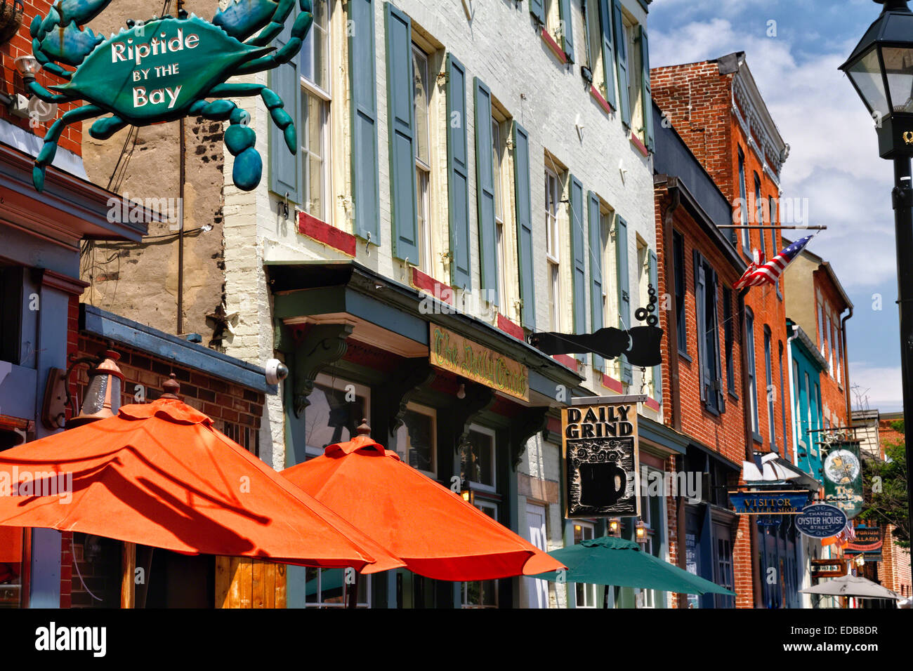 Shop and Pub Signs on Colorful Historic Houses, Fells Point, Baltimore Harbor, Maryland, USA Stock Photo