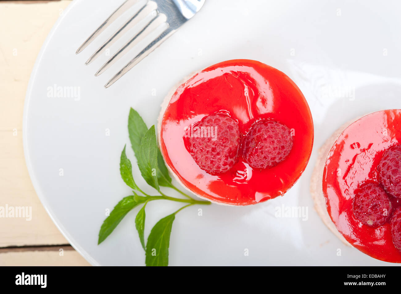 Round Raspberry Sweets fresh raspberry cake mousse dessert round shape with mint leaves Stock ...