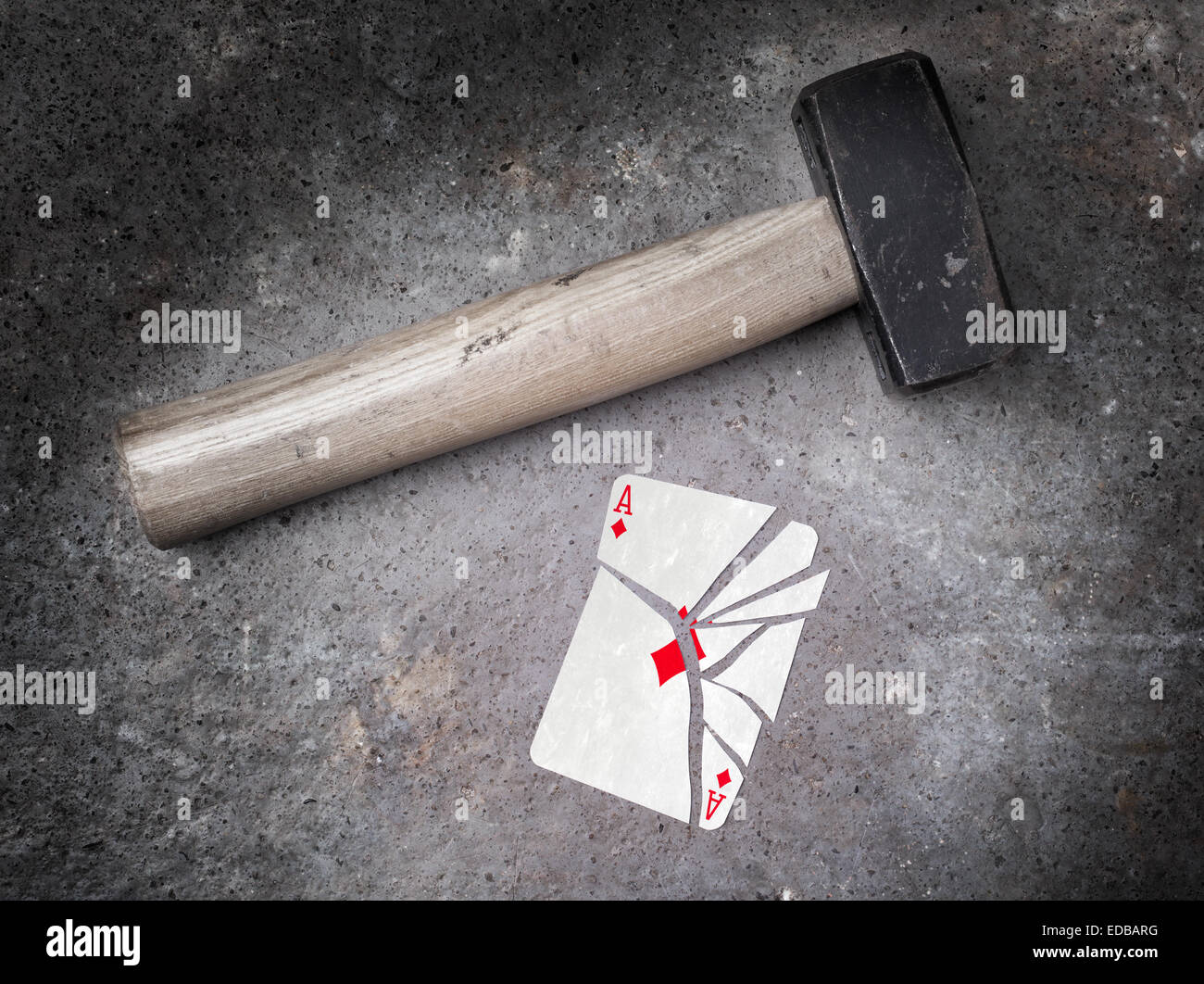 Hammer with a broken card, vintage look, ace of diamonds Stock Photo