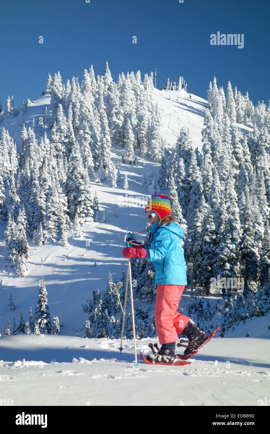 Girl snowshoeing, Hurricane Ridge, Clallam County, Olympic National Park, Washington, USA Stock Photo