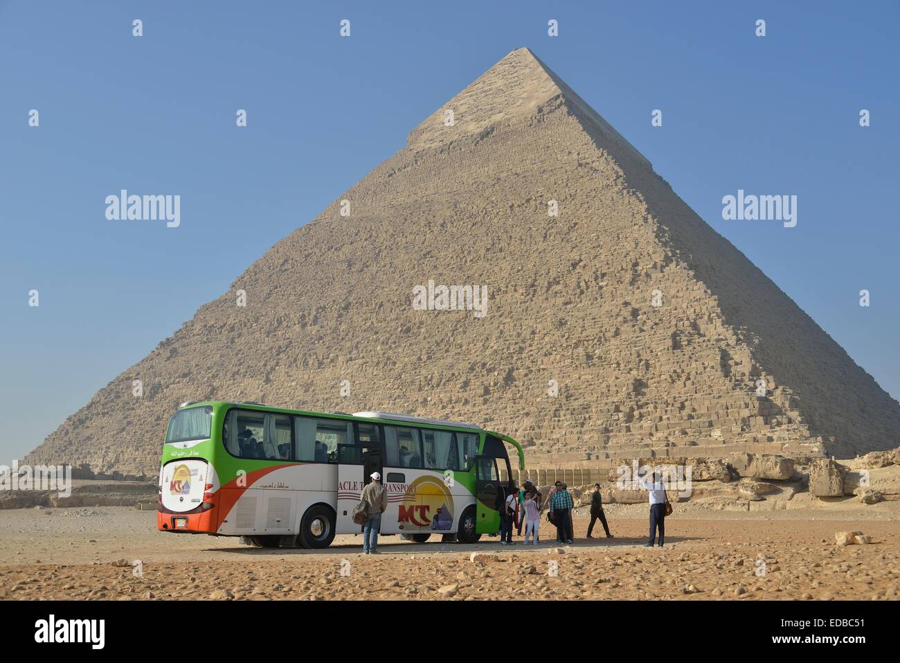Tourist bus in front of the Pyramid of Chephren, Giza, Egypt Stock Photo