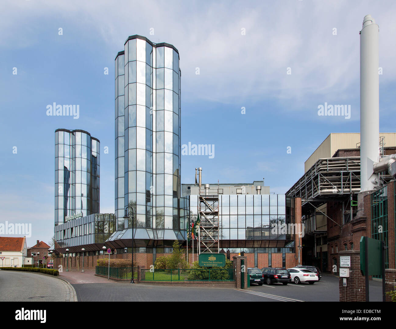 Mirrored glass towers, Friesian brewhouse, Jever, Frisia, Lower Saxony, Germany Stock Photo