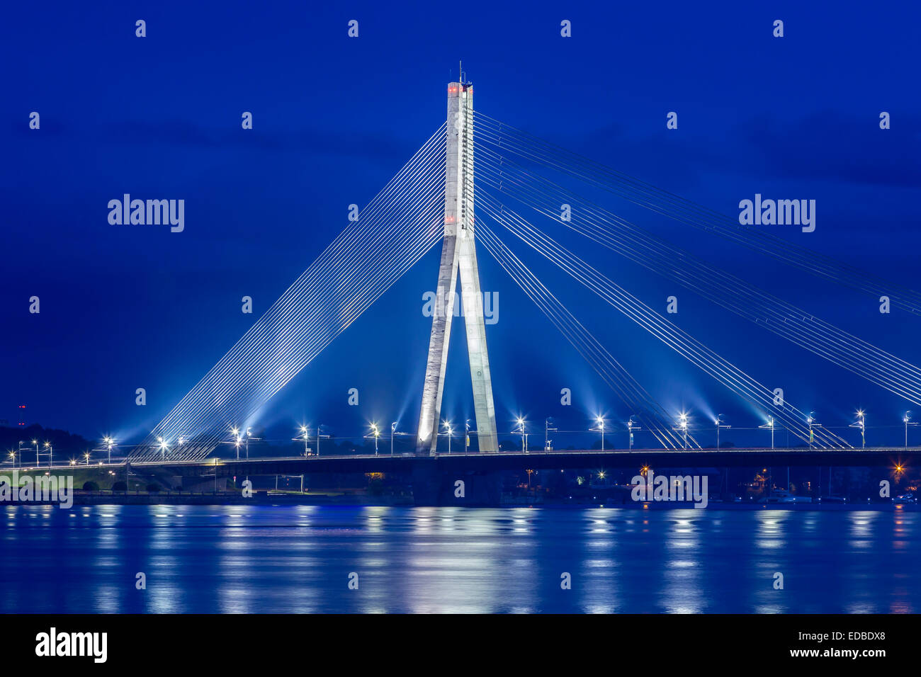 Vanšu Bridge, cable-stayed bridge, dusk, blue hour, over the Daugava river or Western Dvina, Riga, Latvia Stock Photo