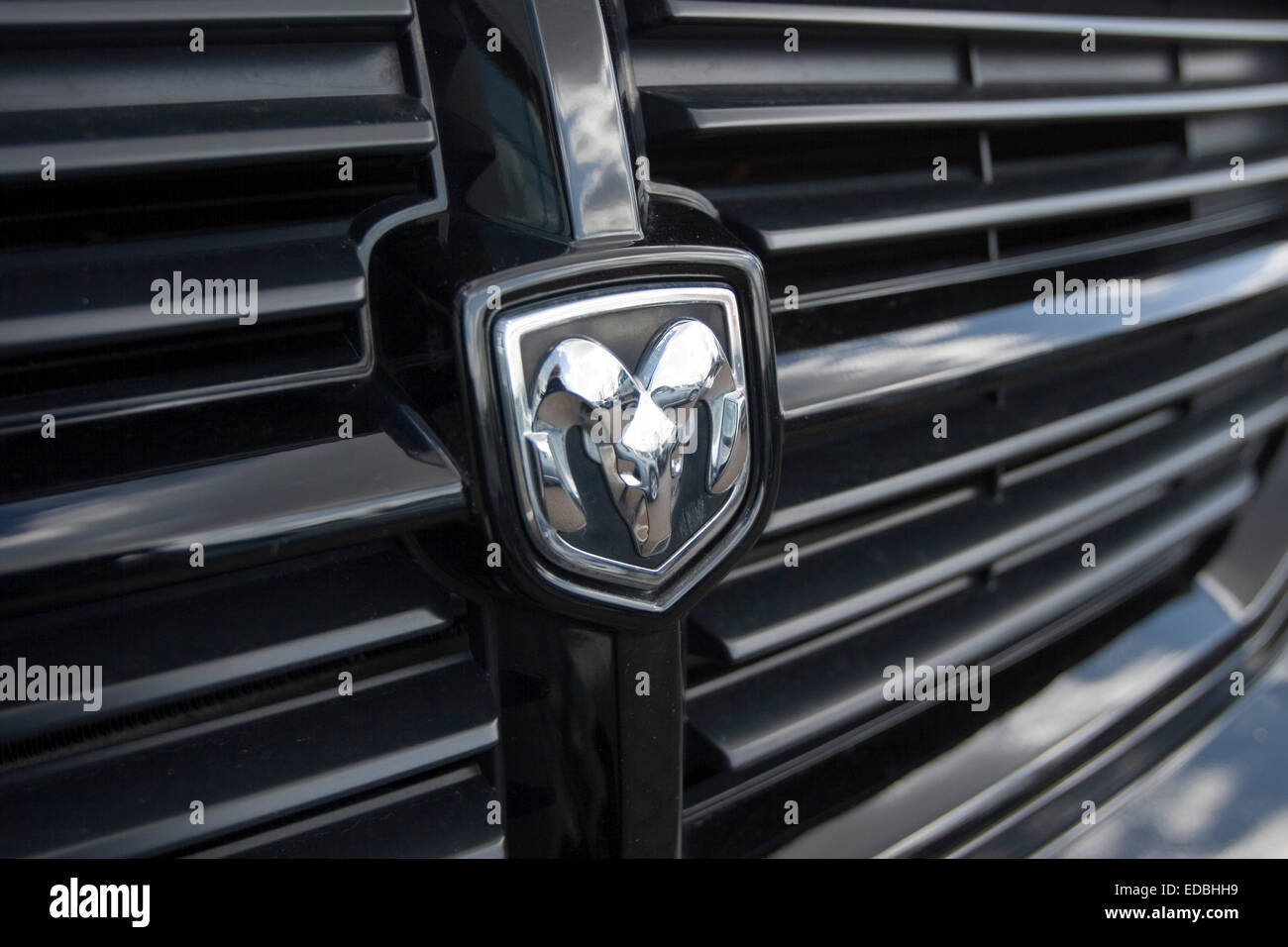 The Dodge emblem on the front of a black pick-up truck Stock Photo