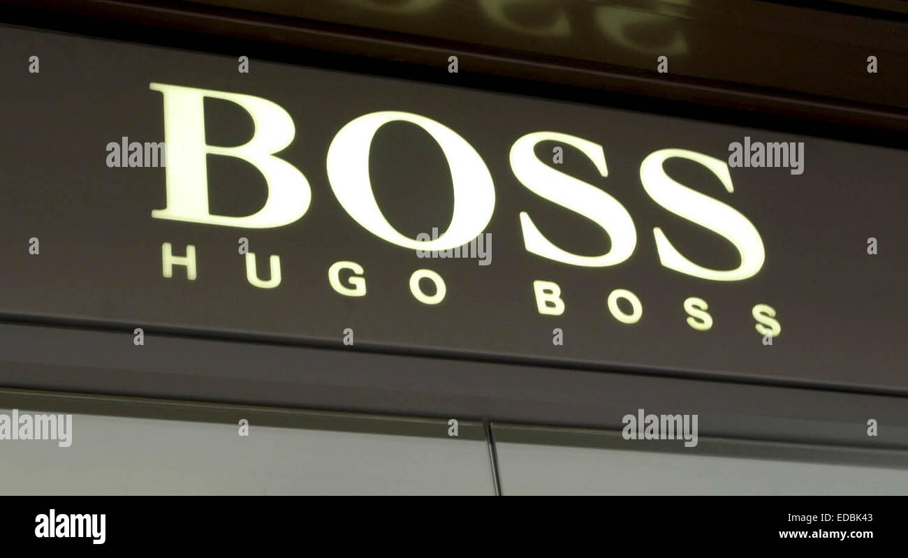Picture shows the Hugo Boss logo above a store entrance. Stock Photo