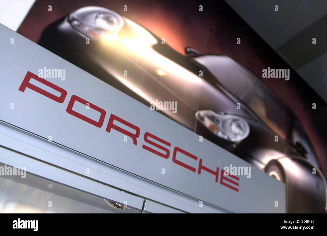 Picture shows a poster and Porche branding. Stock Photo