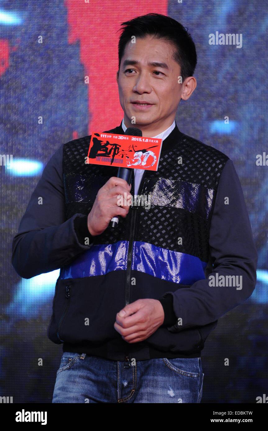 (150105) -- BEIJING, Jan. 5, 2015 (Xinhua) -- Actor Tony Leung Chiu-Wai, who plays as Ip Man in the martial-arts film 'The Grandmasters 3D', attends a premiere ceremony in Beijing, capital of China, Jan 5, 2015. 'The Grandmasters 3D', directed by Kar Wai Wong, is a 3D adaptation of the 2013 film 'The Grandmasters'. The public screening of the new film is scheduled on Jan. 8, 2015. (Xinhua) (lmm) Stock Photo