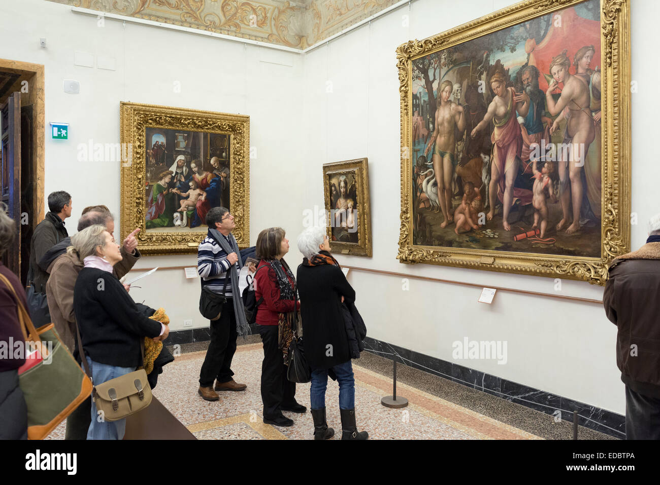 Rome. Italy.  Visitors looking at artwork, Palazzo Barberini. Galleria Nazionale d'Arte Antica. Stock Photo
