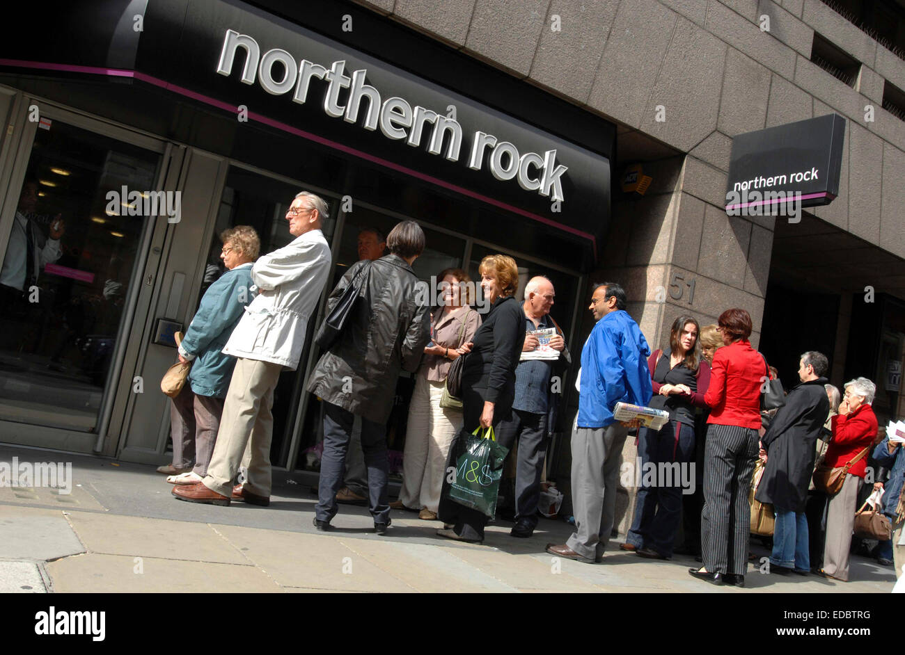People queuing outside branch northern rock hi-res stock photography and  images - Alamy