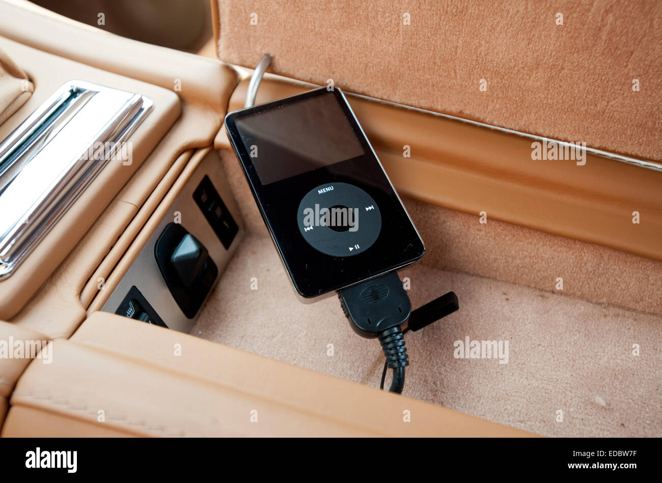 iPod music player connected to a car stereo Stock Photo Alamy