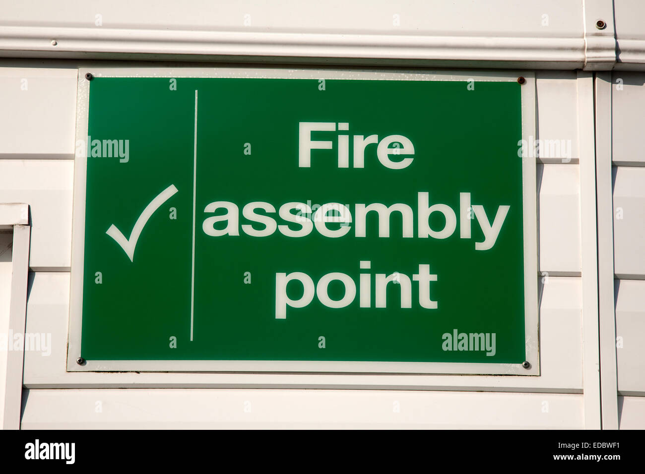 Green Fire Assembly Point Sign Stock Photo