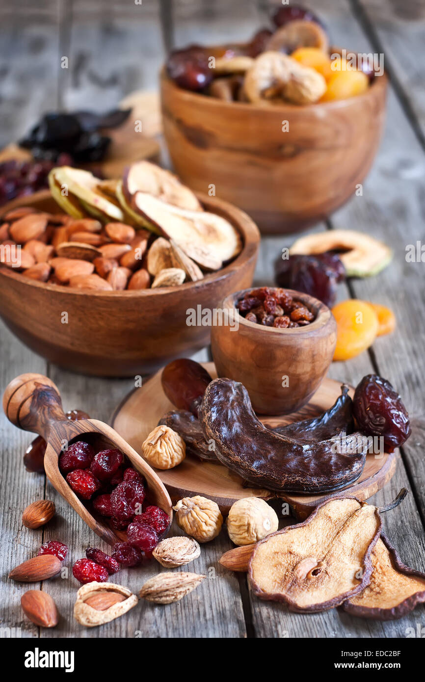 Mix of dried fruits and almonds - symbols of judaic holiday Tu Bishvat. Stock Photo