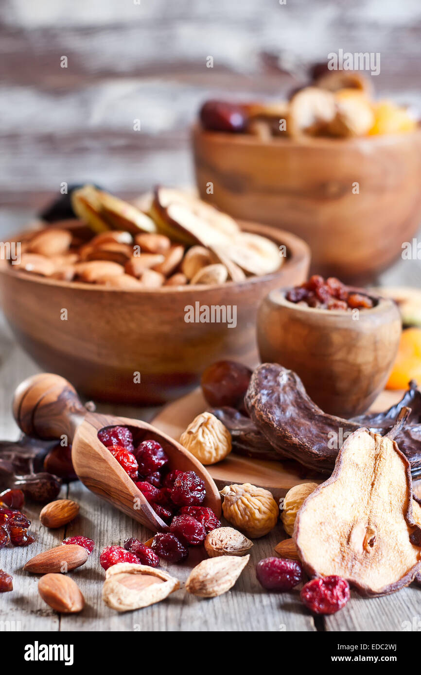Mix of dried fruits and almonds - symbols of judaic holiday Tu Bishvat. Stock Photo