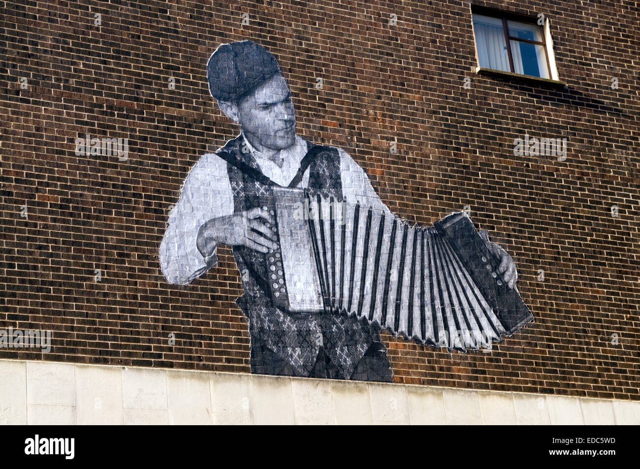 Graffiti of accordion player, Cardiff, City Centre, Cardiff, South Wales, UK. Stock Photo