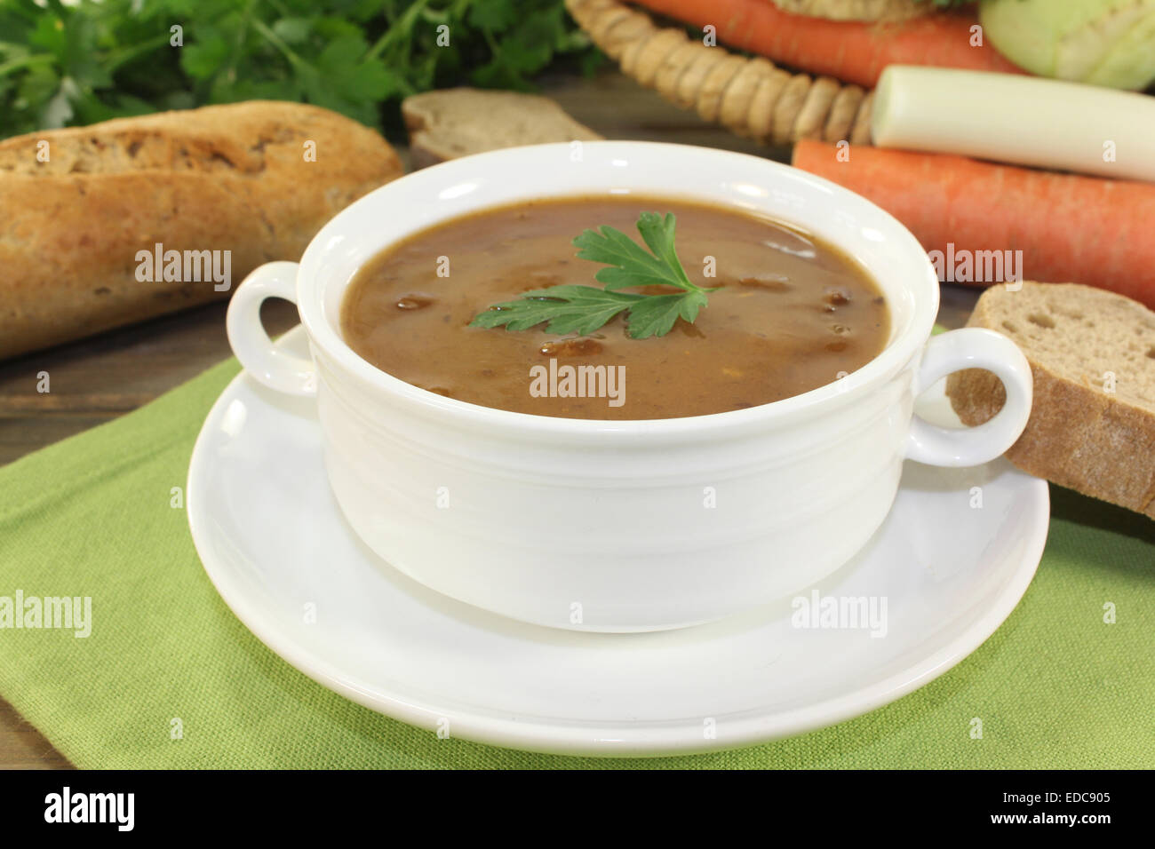 a cup of oxtail soup and parsley Stock Photo