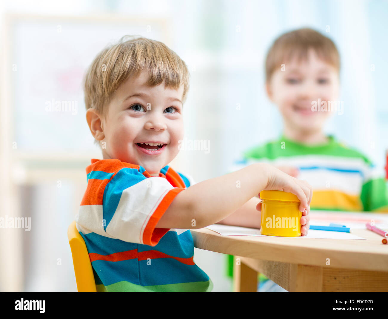 smiling kids painting at home Stock Photo