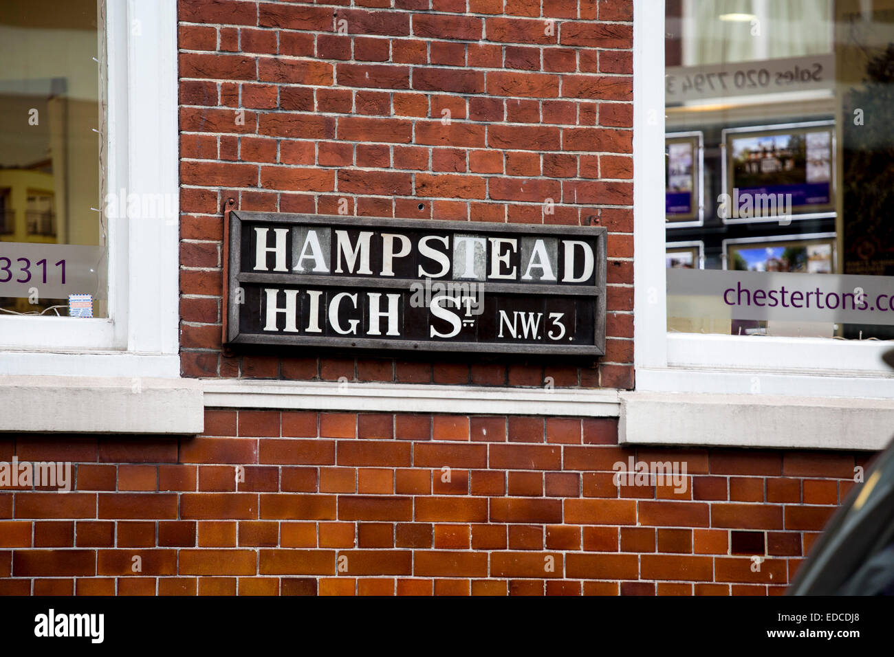 Hampstead High Street sign NW3 road brick wall Stock Photo Alamy