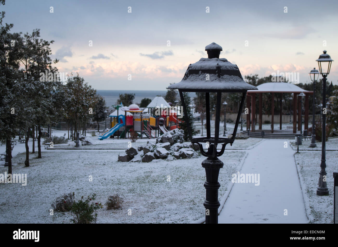 Lamp park with snow  in Torre del Greco (Naples Italy) Stock Photo