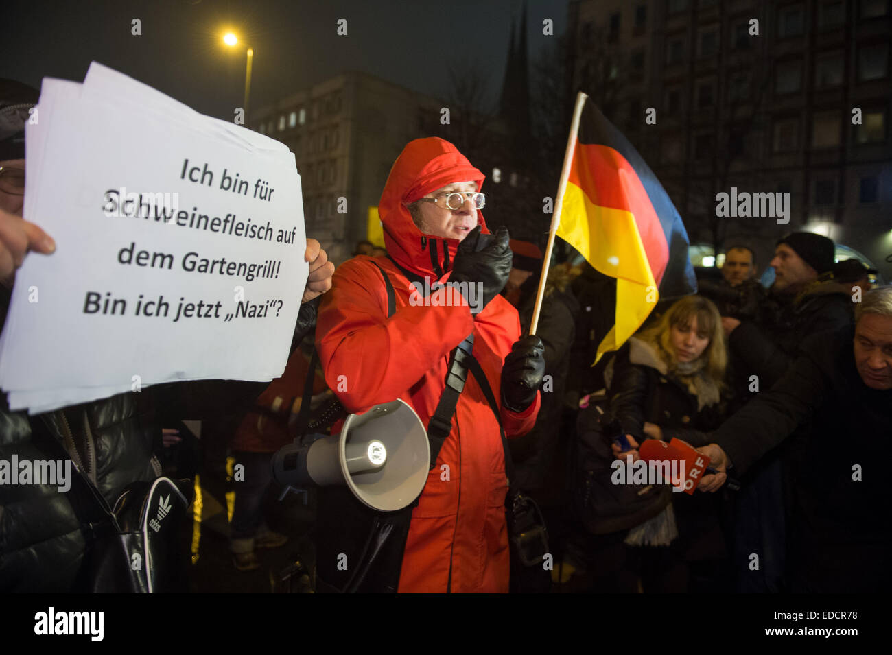 Berlin, Germany. 5th Jan, 2015. Followers of the movement 'Baergida' (Berlin Patriots against the islamization of the Occident) protest in Berlin, 5 January 2015. Right-wing initiative PEGIDA (Patriotic Europeans against the Islamization of the Occident) organizes protests against the alleged foreign infiltration in several citys. Several organizations announced ounterdemonstrations in Berlin. FOTO: BERND VON JUTRCZENKA/DPA/Alamy Live News Stock Photo