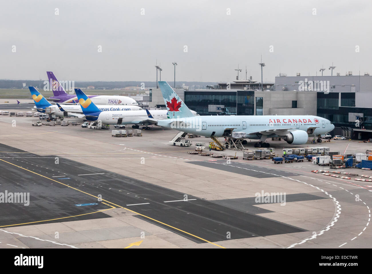 Air Canada, Thai and Thomas Cook airplanes at the Frankfurt International Airport Stock Photo