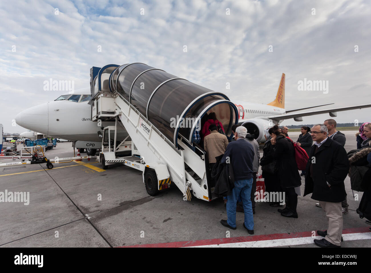 Boarding Pegasus airline airplane at the Frankfurt International Airport. Stock Photo