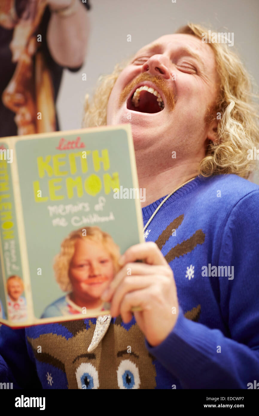 Asda Swinton, Salford Gtr Manchester book signing by Keith Lemon  Pictured with his book Little Keith lemon Memories of me Child Stock Photo
