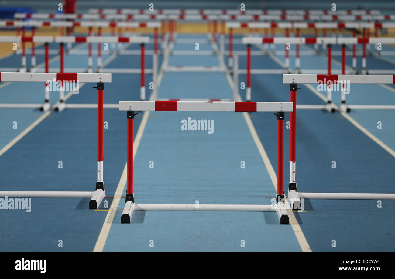 Barriers over a running track in athletics hall Stock Photo Alamy