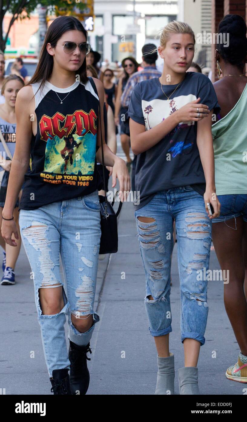 Kendall Jenner Wearing Ripped Pants And An Acdc Top Hangs