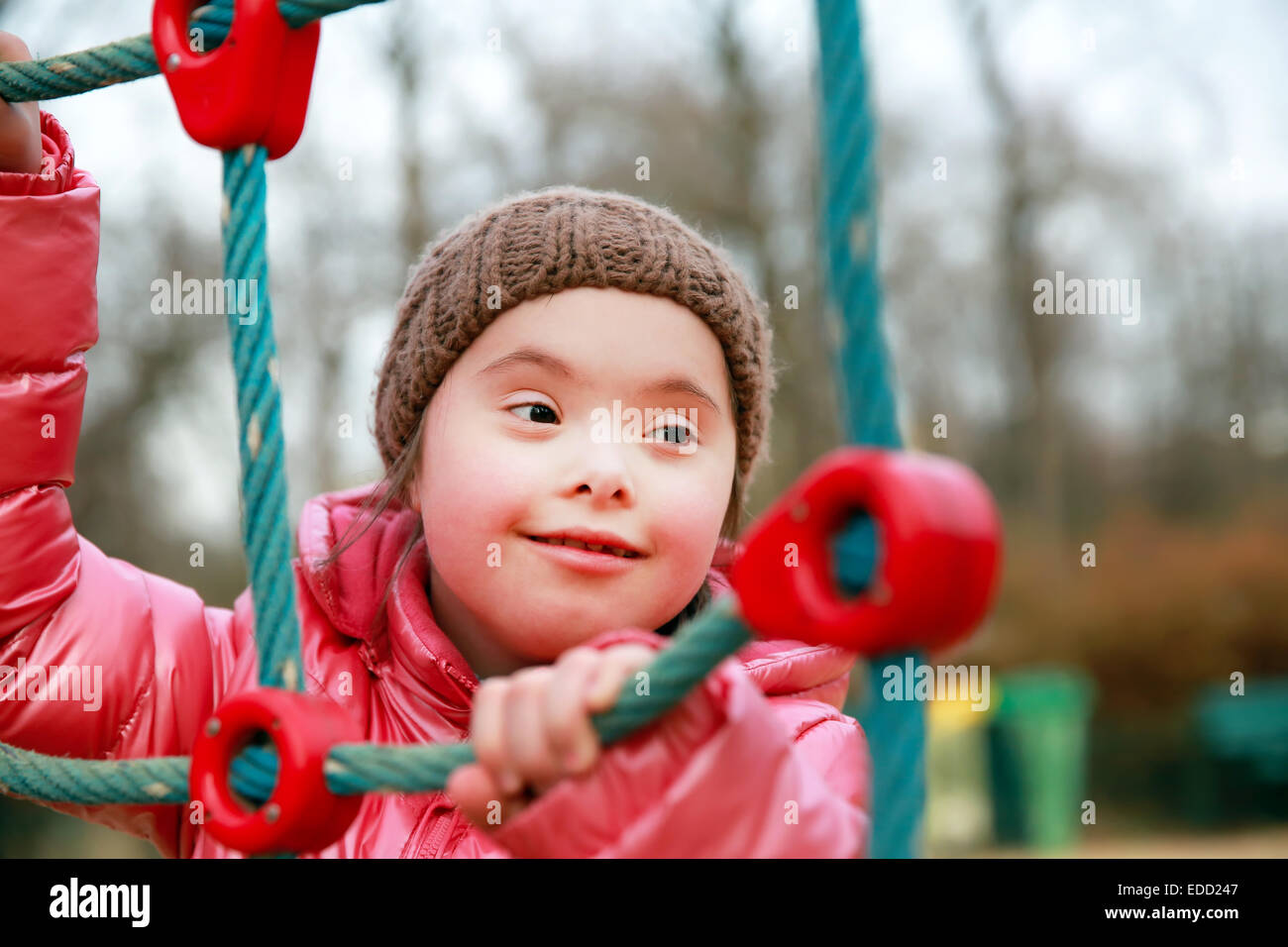 Portrait of beautiful girl on the playground Stock Photo - Alamy