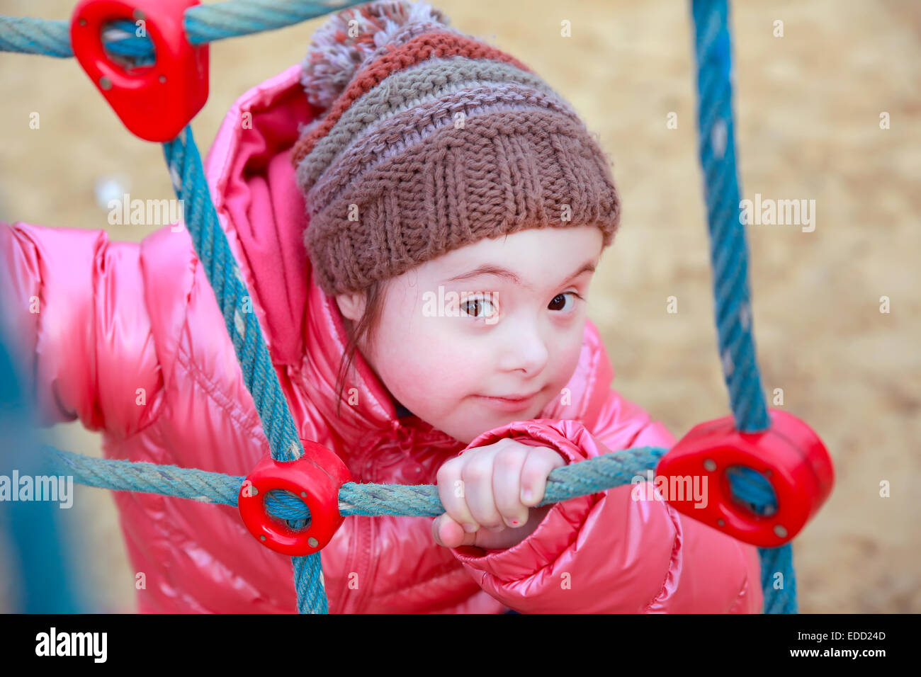 Portrait of beautiful girl on the playground Stock Photo - Alamy