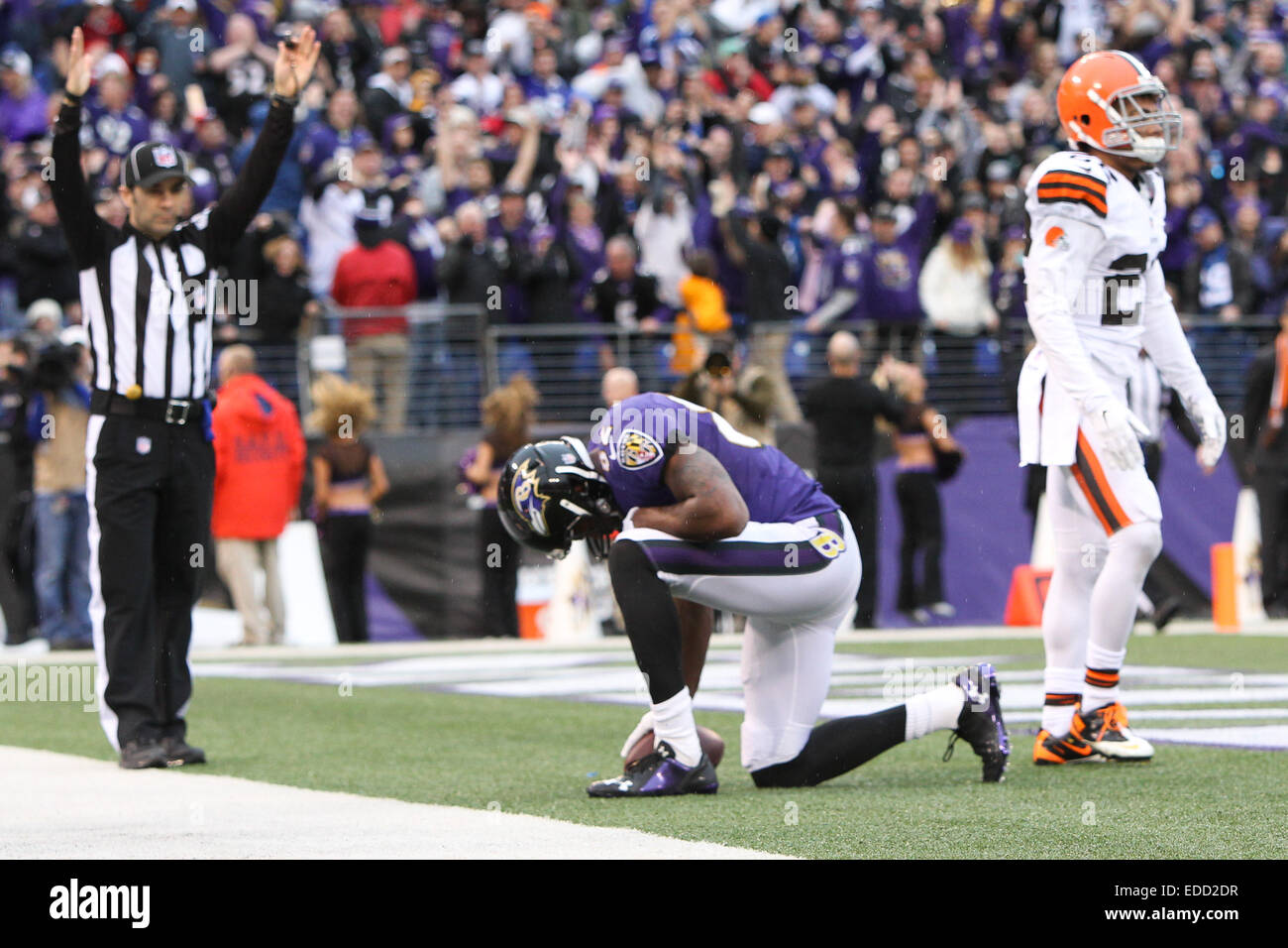 Baltimore, Maryland, USA. 28th Dec, 2014. Baltimore Ravens wide receiver Torrey Smith (82) celebates in the endzone as Cleveland Browns defensive back Buster Skrine (22) walks away on December 28, 2014 at M&T Bank Stadium. © Debby Wong/ZUMA Wire/Alamy Live News Stock Photo