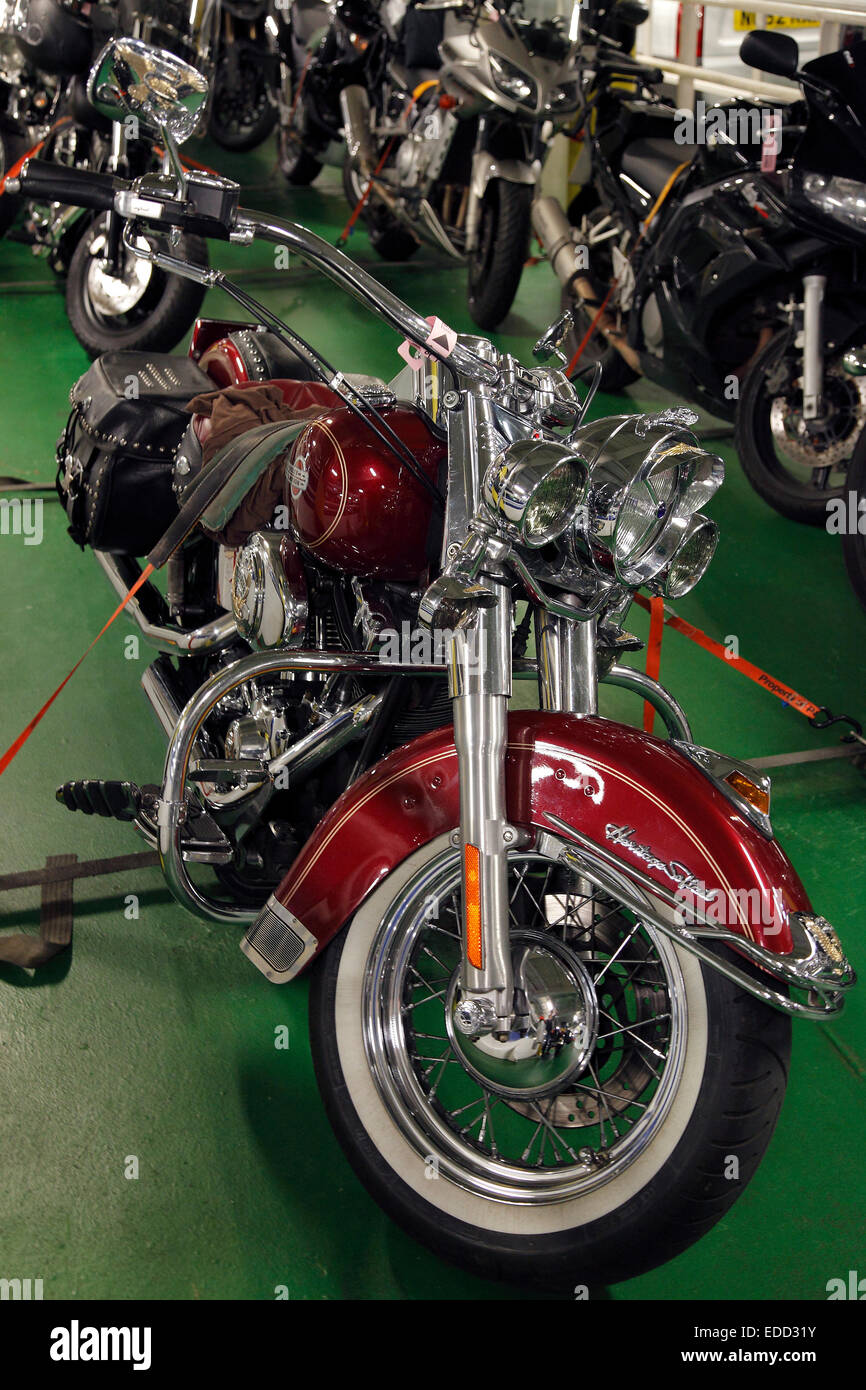 Harley-Davidson Heritage Softail bike on car deck of a ferry Stock Photo