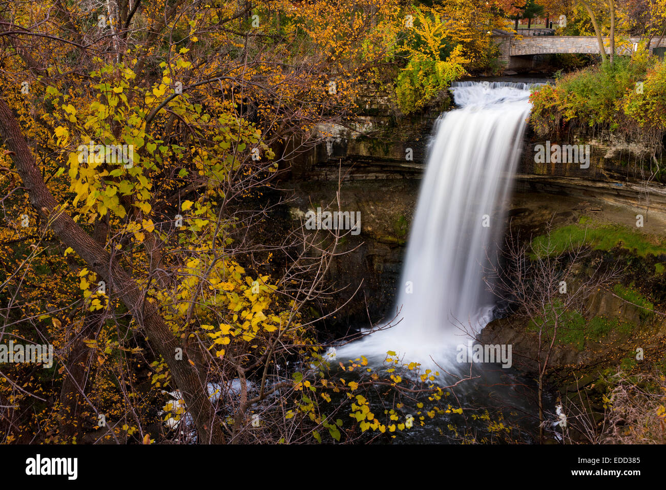 Minnehaha Falls surrounded by autumn colors. Stock Photo