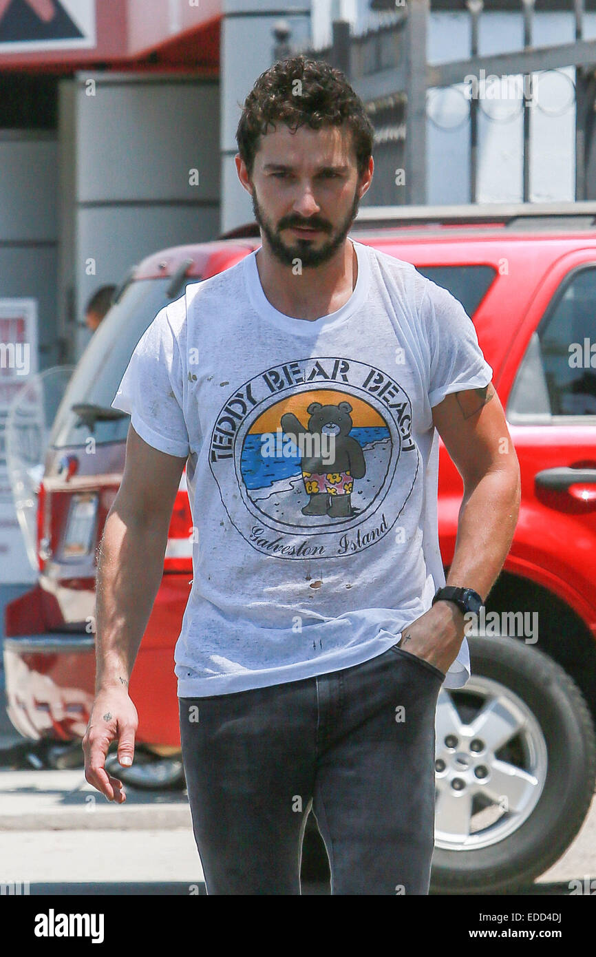 Shia LaBeouf another of his favorite t-shirts 'Teddy Bear Beach' as leaves from a workout session at a gym Featuring: Shia LaBeouf Where: Los Angeles, California, United States When: 03