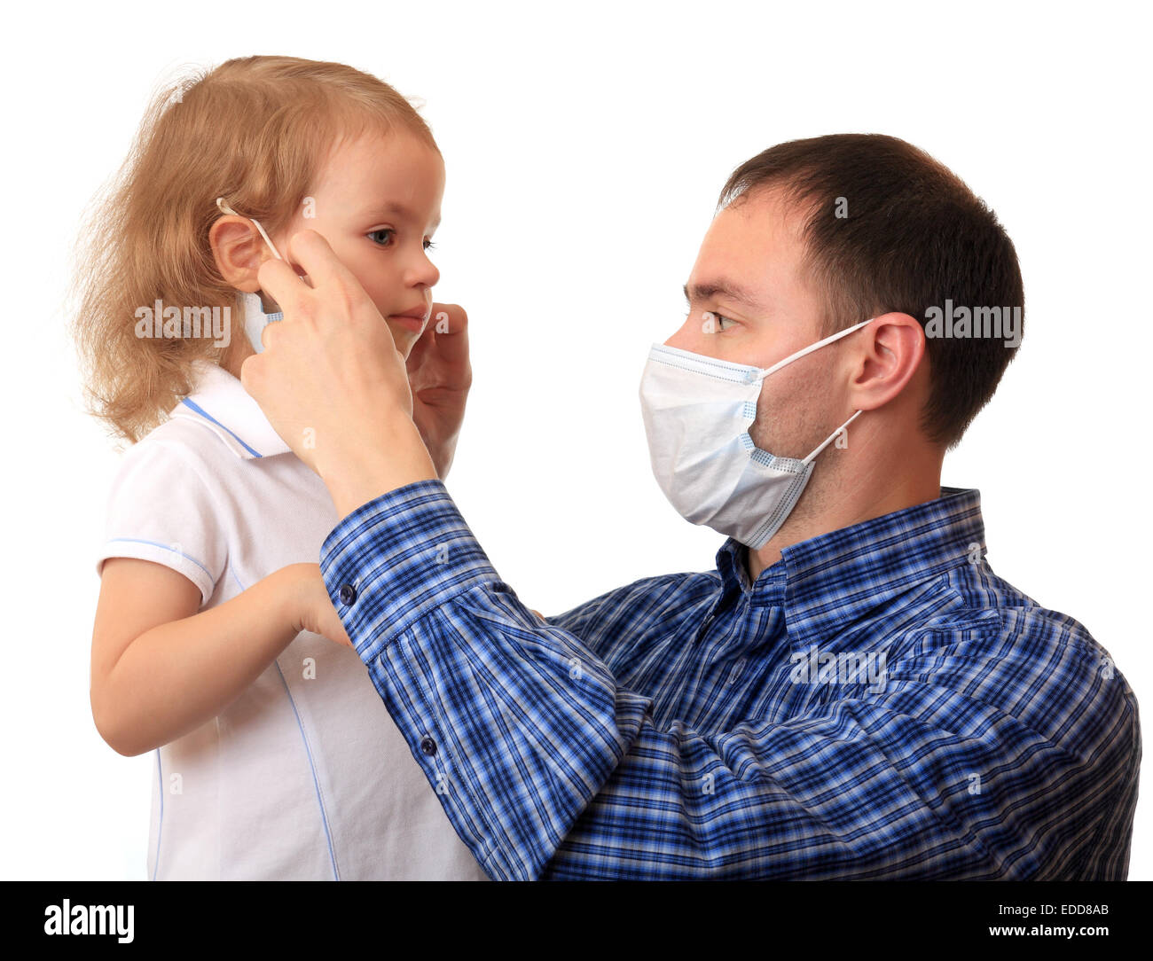 The girl puts on a mask hi-res stock photography and images - Alamy