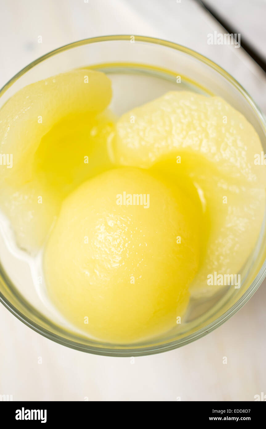 Canned pear dessert in a transparent bowl Stock Photo Alamy