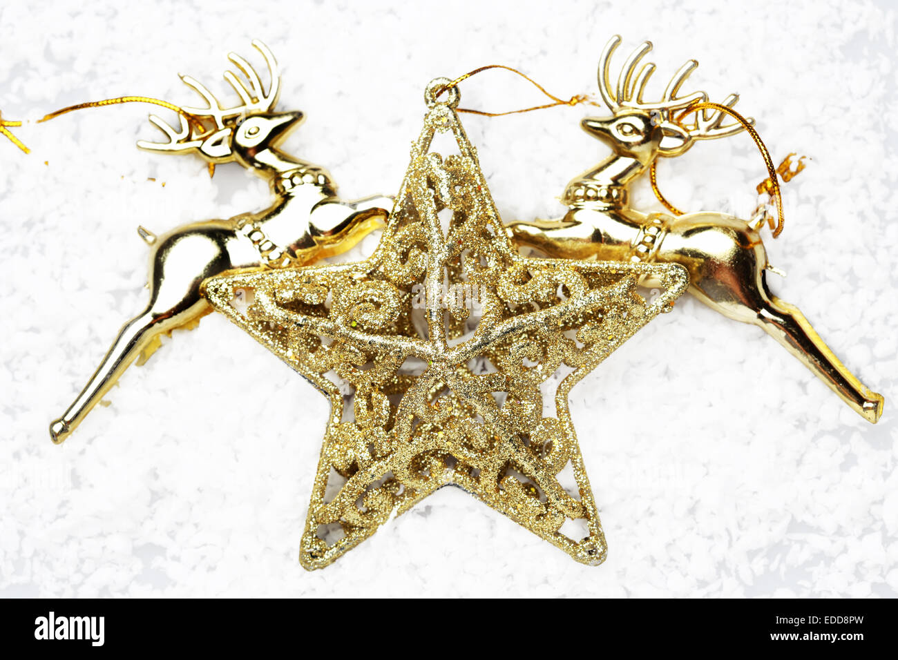 The Gold Star And Gold Reindeer On Snow For Decoration Christmas